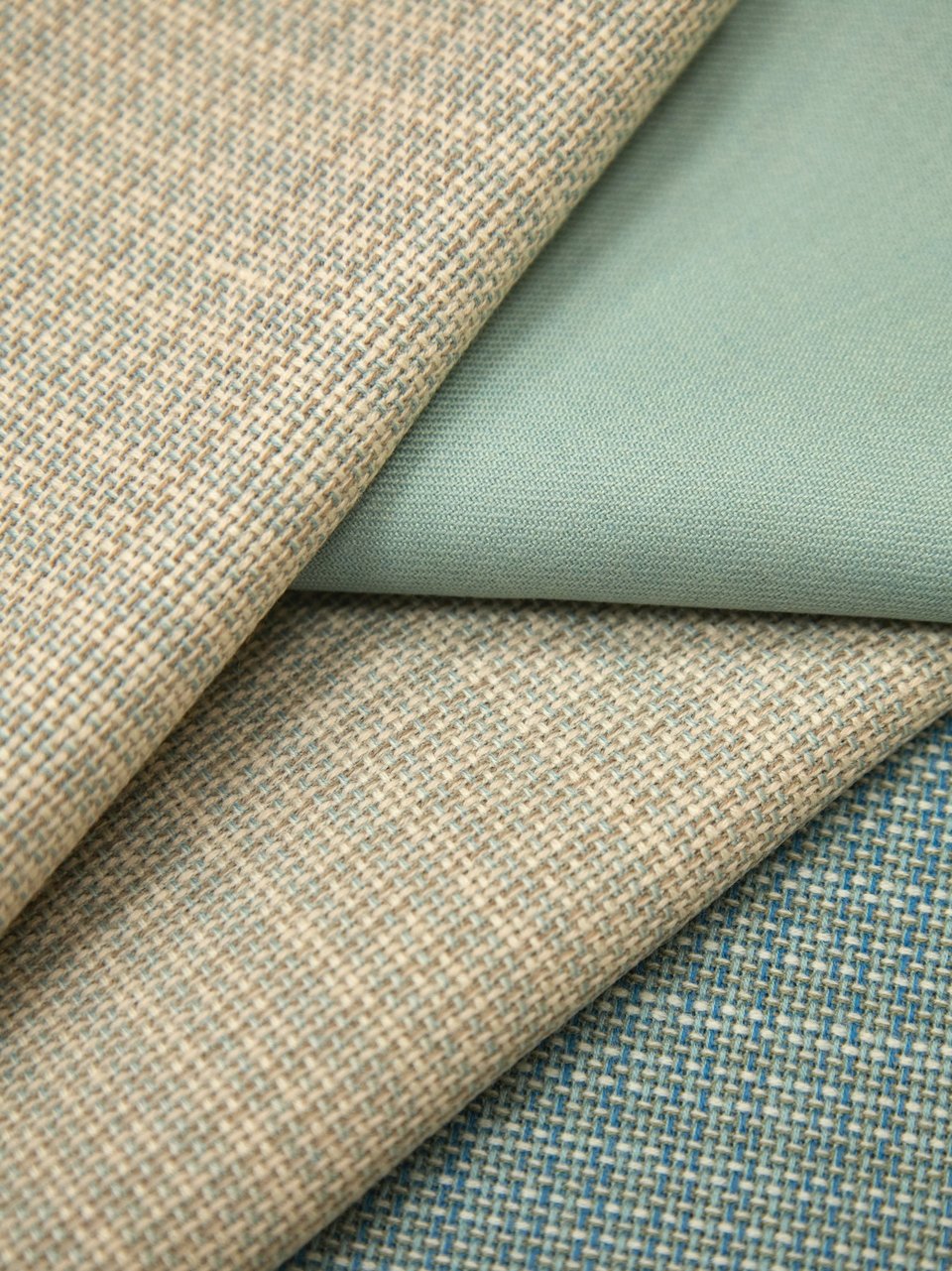 Several fabric samples in different colours