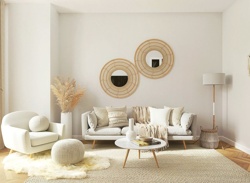 Salon meublé avec un grand miroir